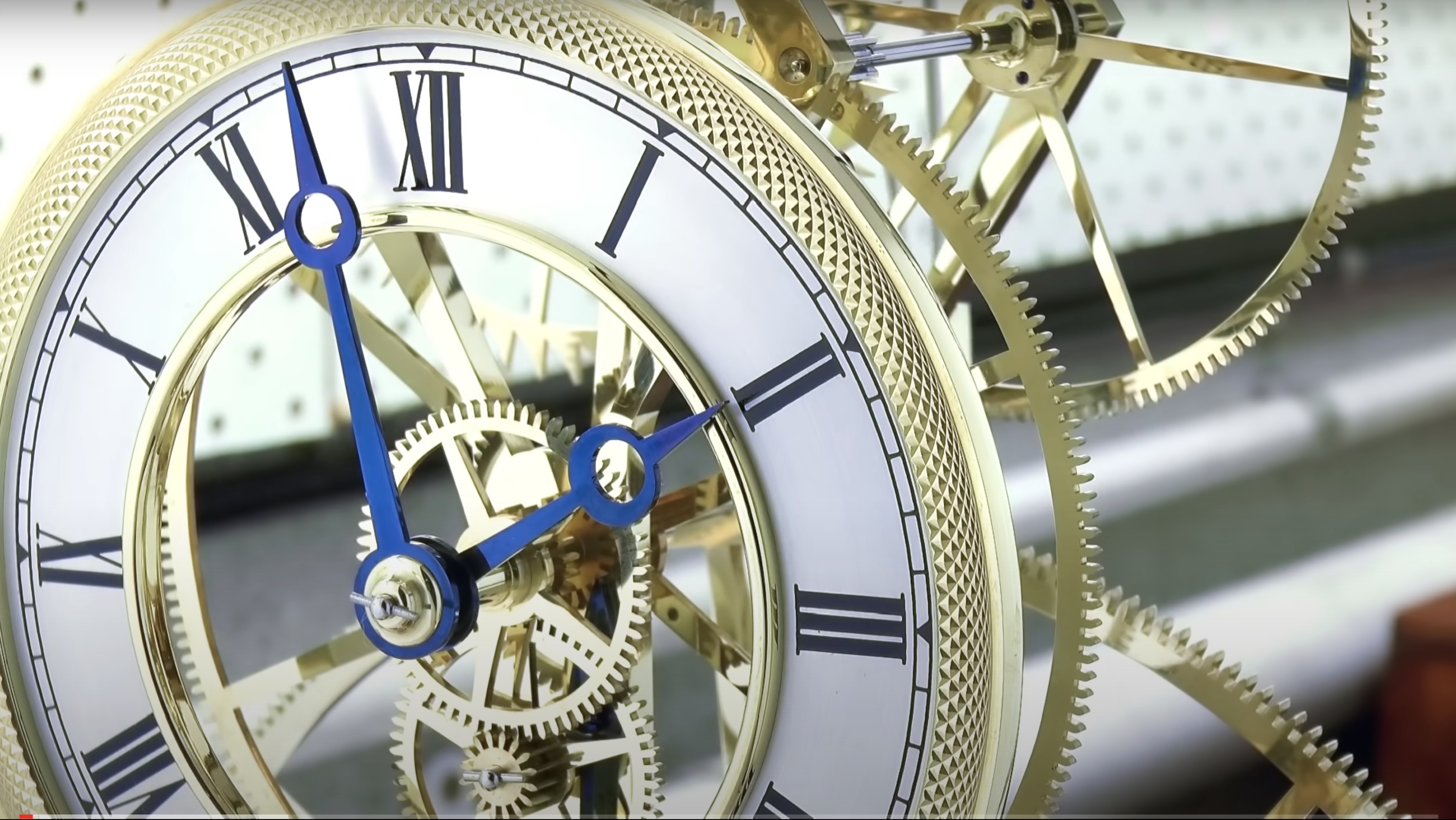 Closeup of skeleton clock with visible gears
