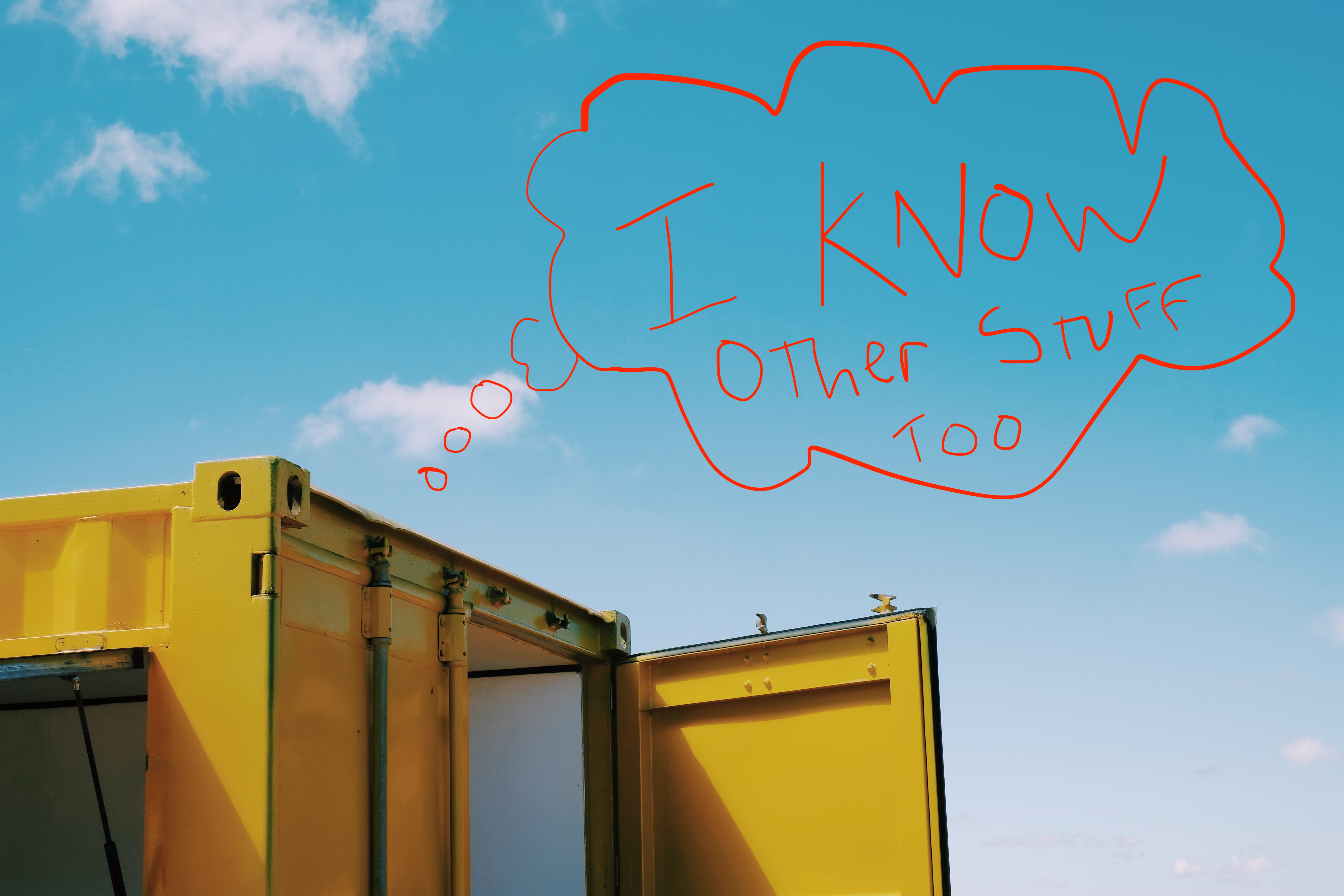 Yellow shipping container
with a red hand-written speech bubble:
I know other stuff too
