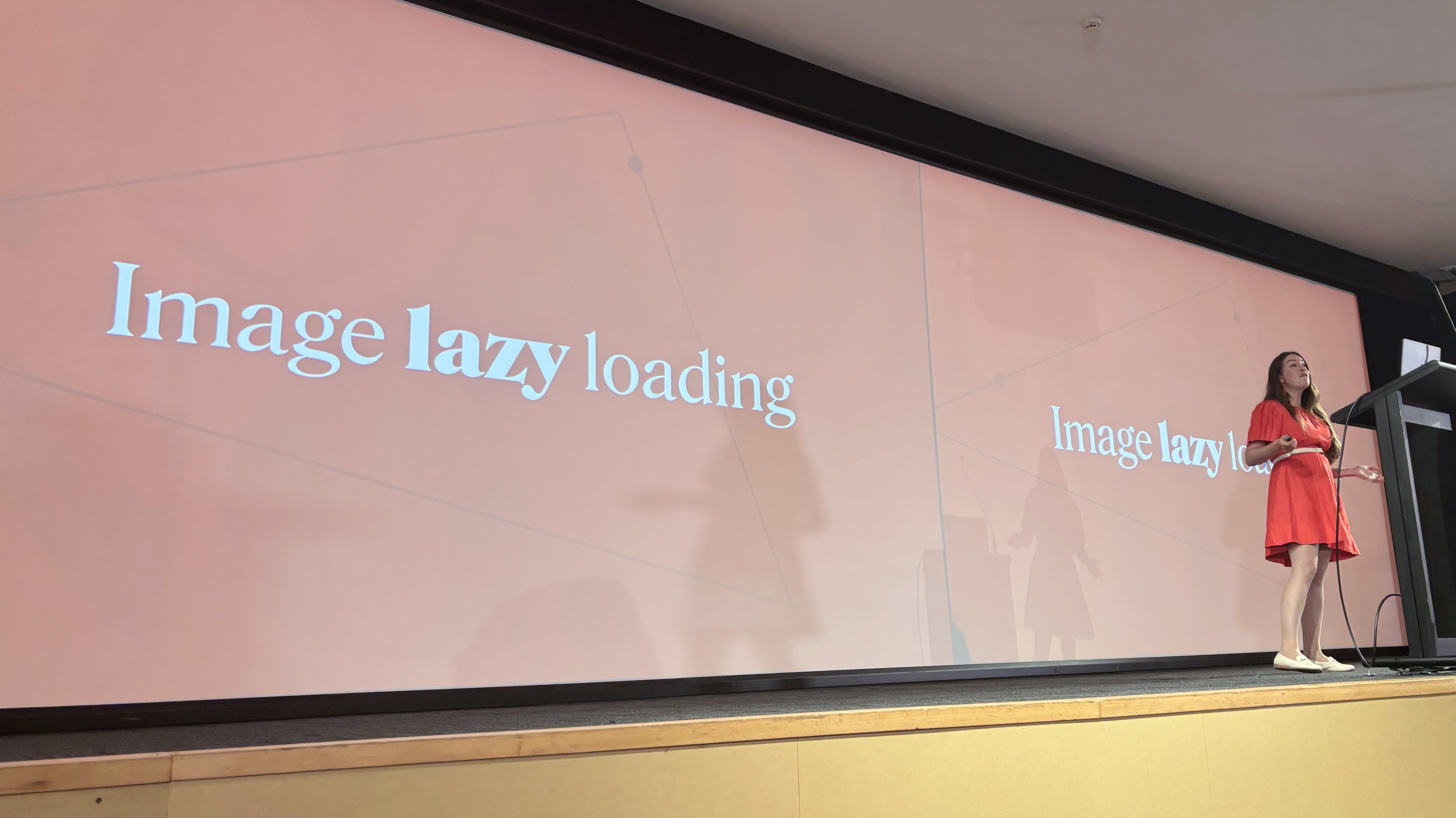 Mandy Michael in front of a slide about lazy loading images
