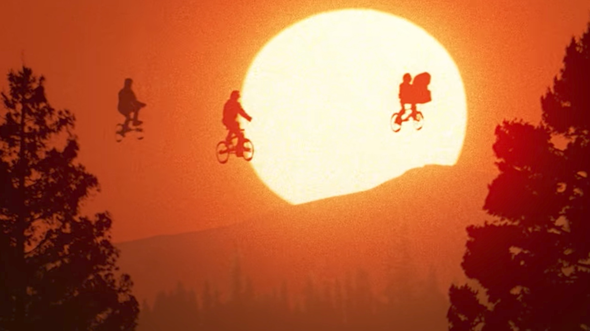 ET and the kids flying their bicycles across the sunset
