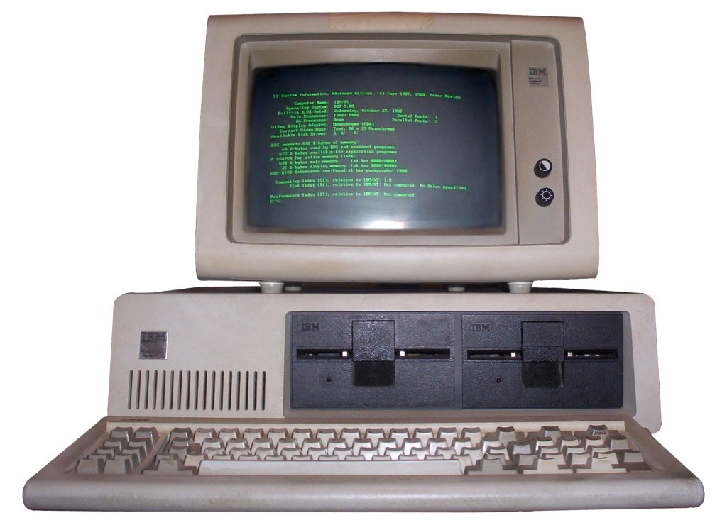 Old IBM desktop with a text-only green on black display
