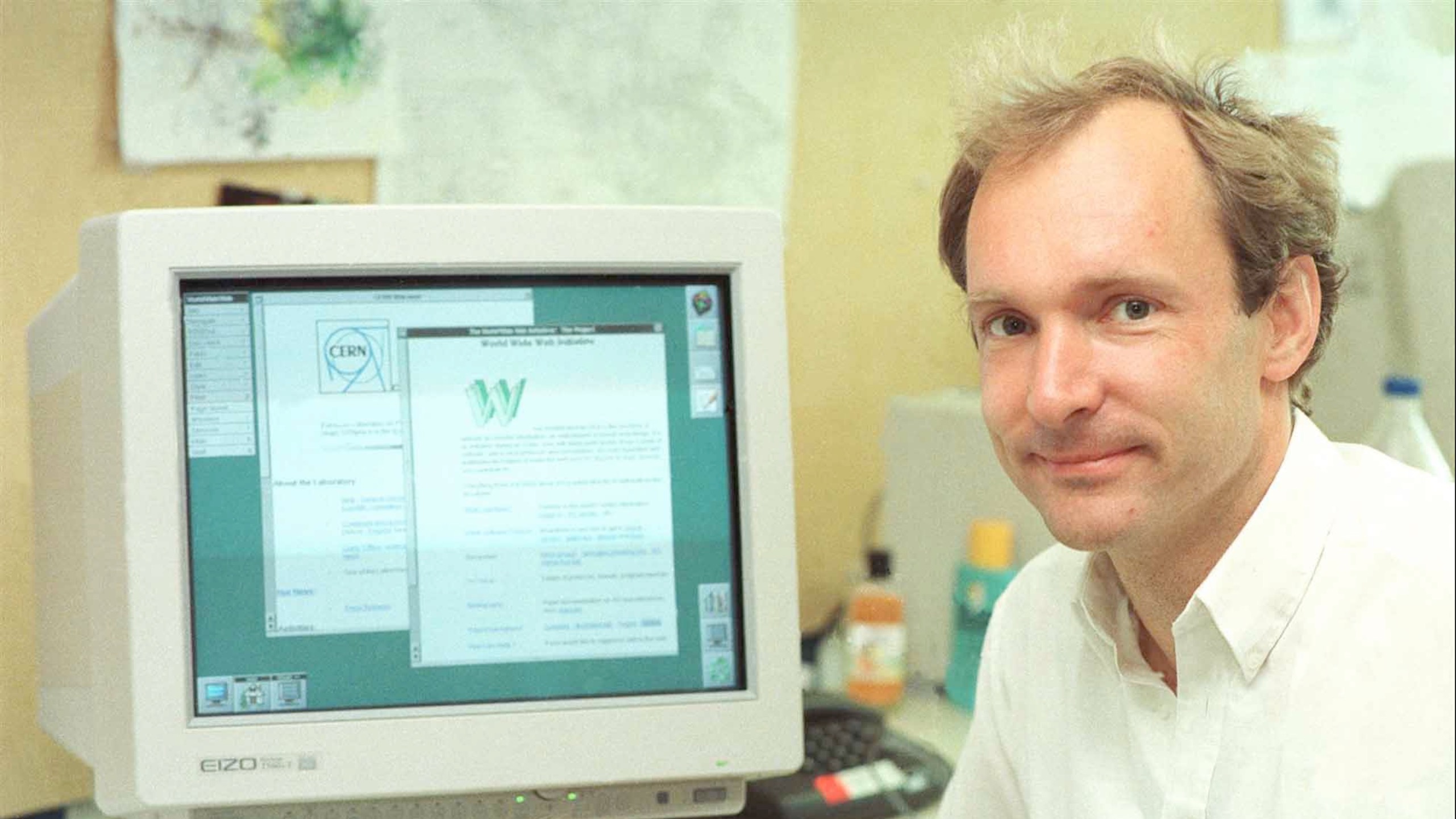 Tim in front of a computer with the first web browser